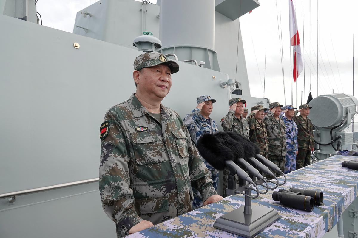Chinese President Xi Jinping and senior PLA leaders on board a PLA Navy destroyer